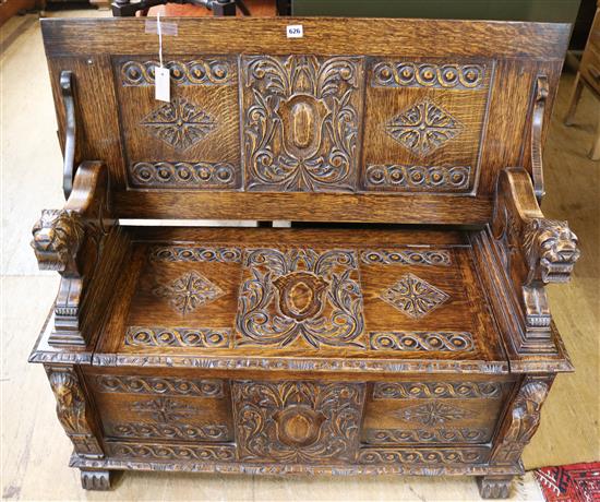 Carved oak monks bench